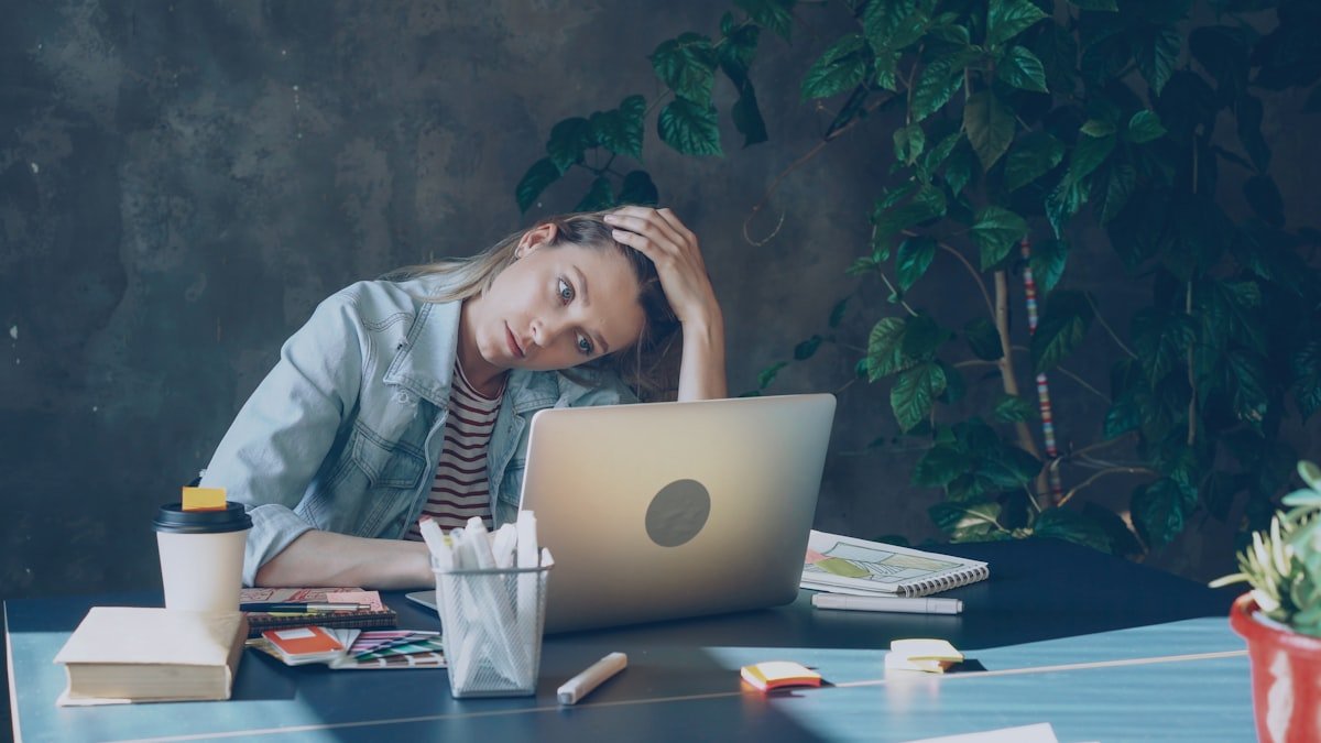 Small business owner comparing quotes to understand small business website cost